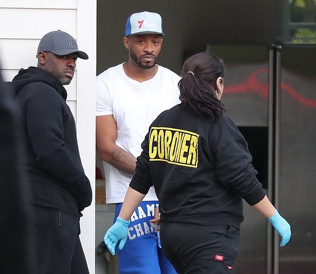 At the scene of Kim Porter's suspicious death. Diddy associate Corey Gable on the left.