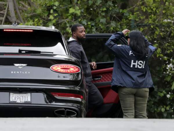 Faheem Muhammed, Diddy's head of security, at Diddy's Beverly Hills mansion during the HSI raid.